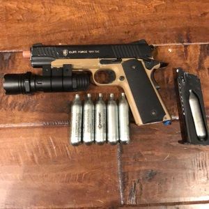 Elite force 1911 tac co2 blowback pistol.